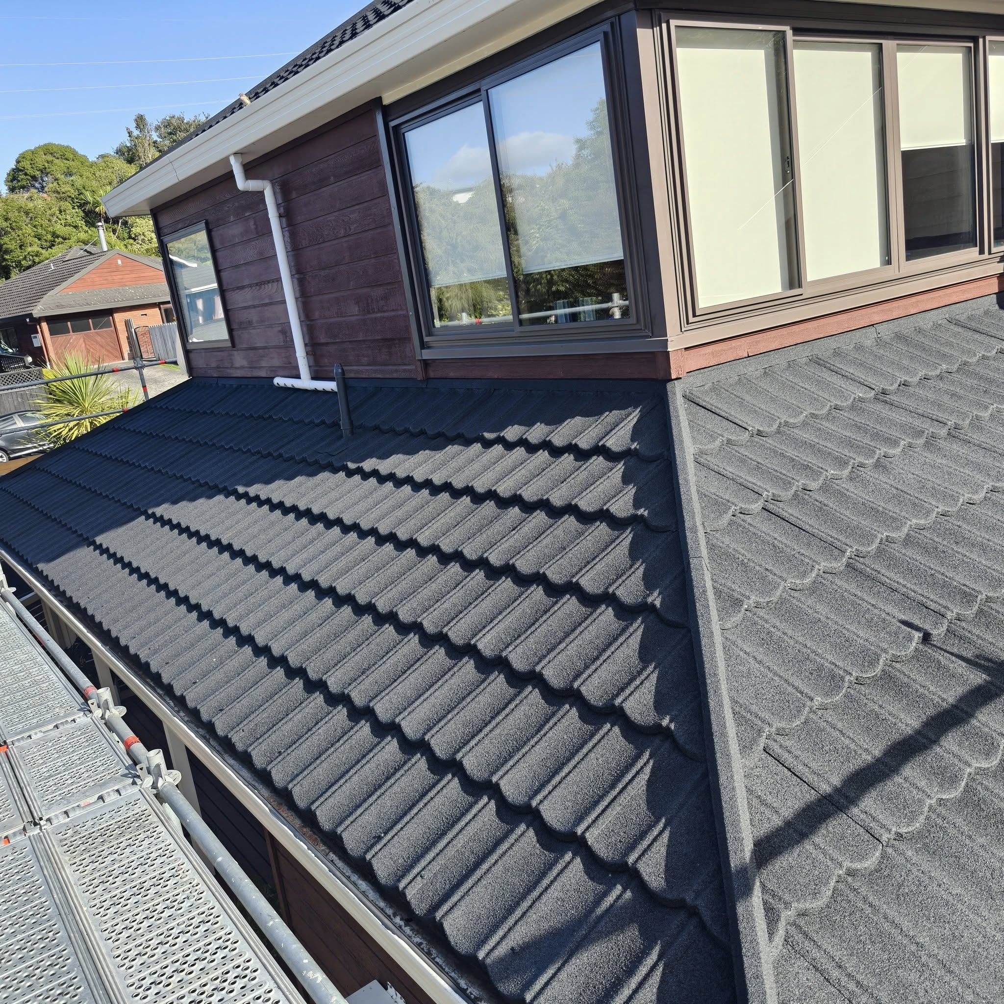 A-frame house with hills